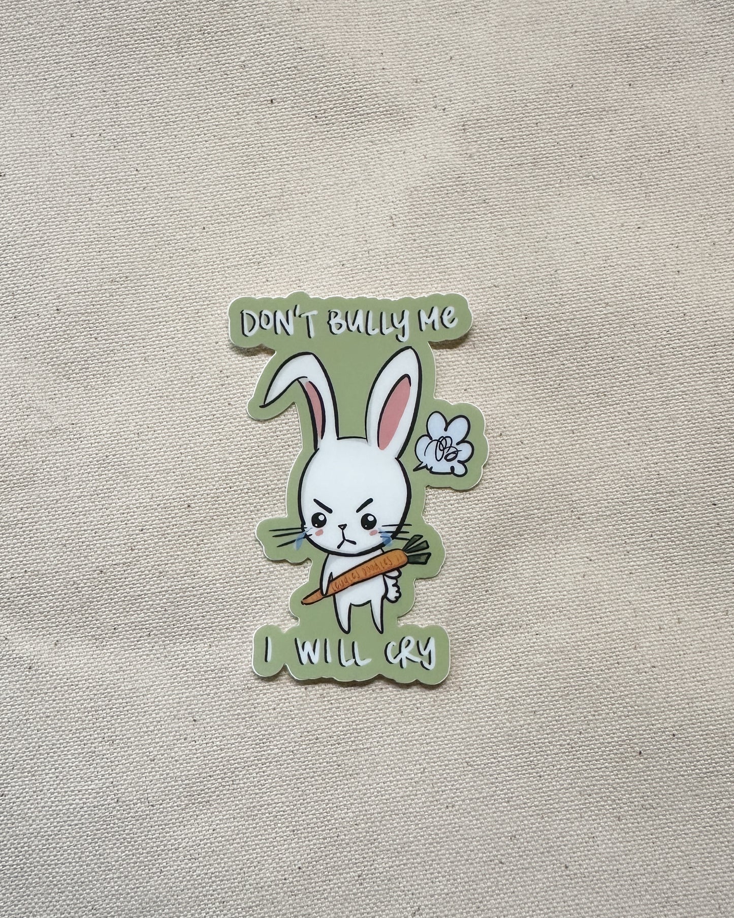 Sticker with a cartoon rabbit holding a carrot and text that says "Don't Bully Me, I Will Cry"