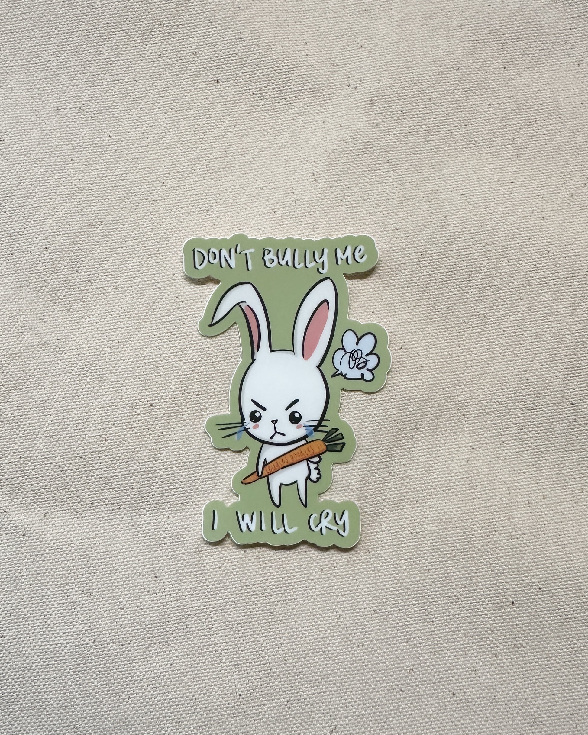 Sticker with a cartoon rabbit holding a carrot and text that says "Don't Bully Me, I Will Cry"